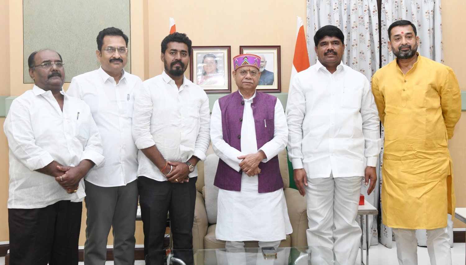 గవర్నర్ ను కలిసిన ఠాకూర్ సూరజ్ సింగ్